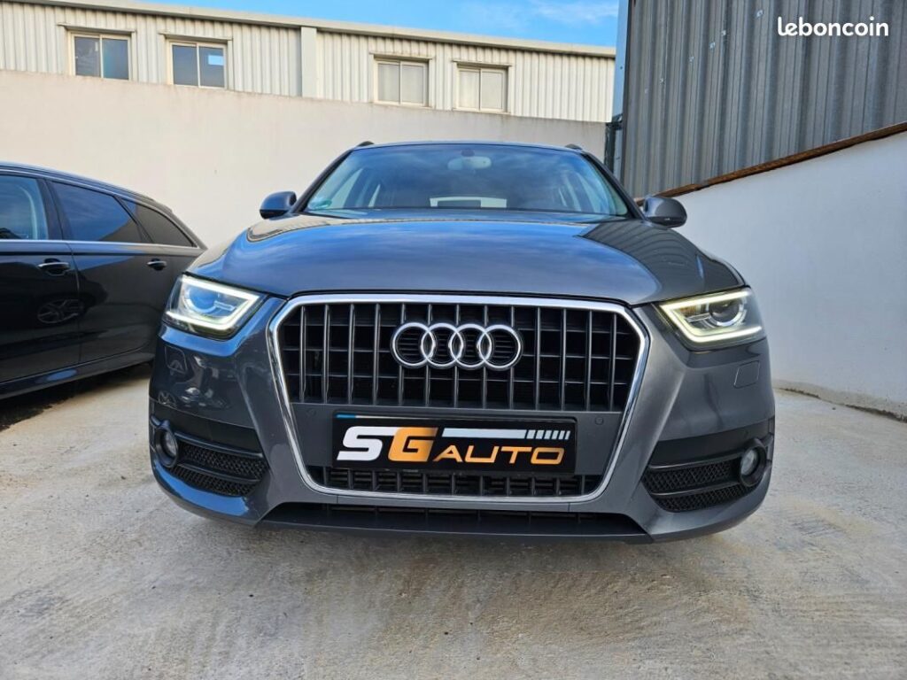 Photo de l’Audi Q3 quattro essence, modèle 2012, 101 000 km, à vendre chez SG Auto à Nîmes. SUV 5 places avec transmission intégral